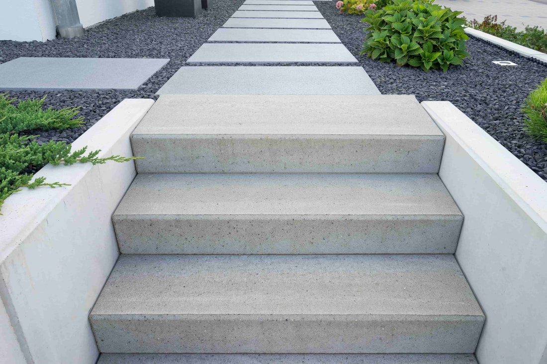 Our Richmond BC client has a modern exterior home. They wanted modern style stair to match this and we went with a very simple yet elegant look with these concrete stairs.
